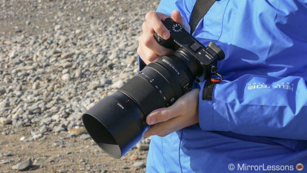 my hands holding the a6400 and 70-300mm lens