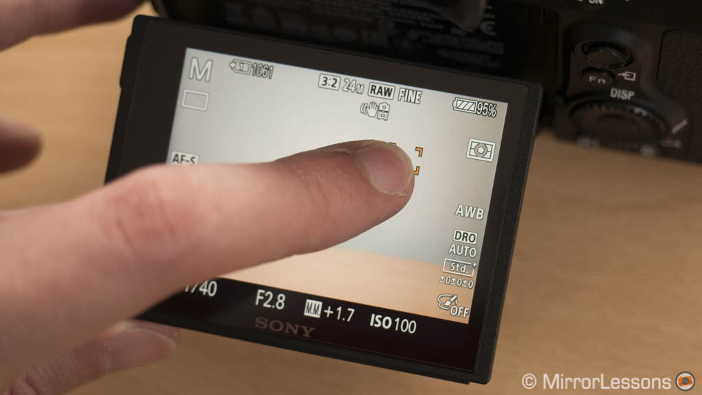 finger moving the AF point on the A7 III lcd screen