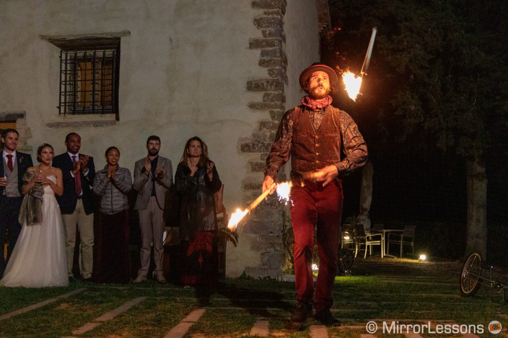 juggler at a wedding reception at night