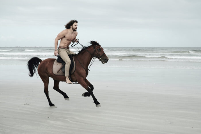 Example of the Eterna Bleach Bypass filter. Man riding on a horse on the beach.