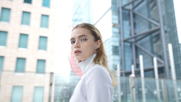 woman portrait with small white rectangle simulating the Eye AF feature