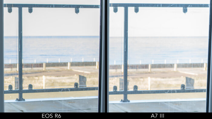 crop on the window with sea view to show the difference after recovering the highlights in post