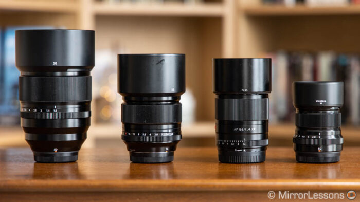 the four lenses side by side with hoods attached