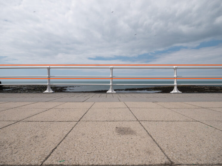 promenade on the seafront with a white handrail