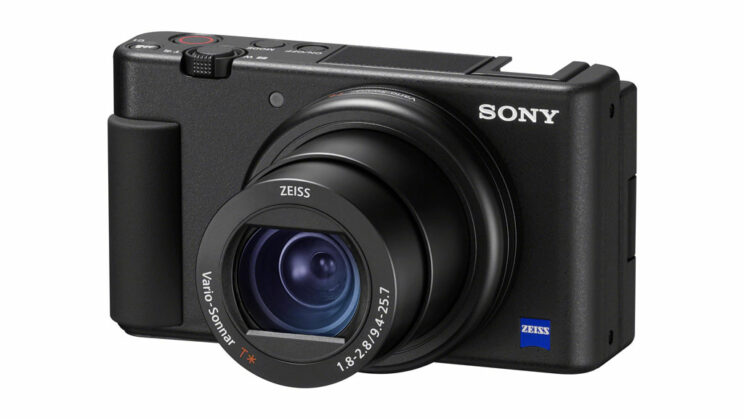 Sony ZV-1 with lens extended, on white background