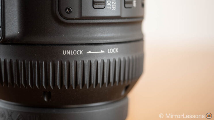 close-up on the unlock ring to extend the lens