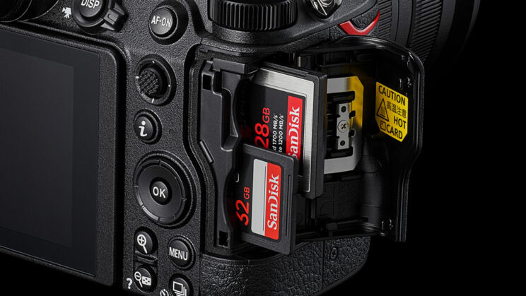 Close-up on the Nikon Z6 II dual slot, with one SD and one CFexpress cards inserted