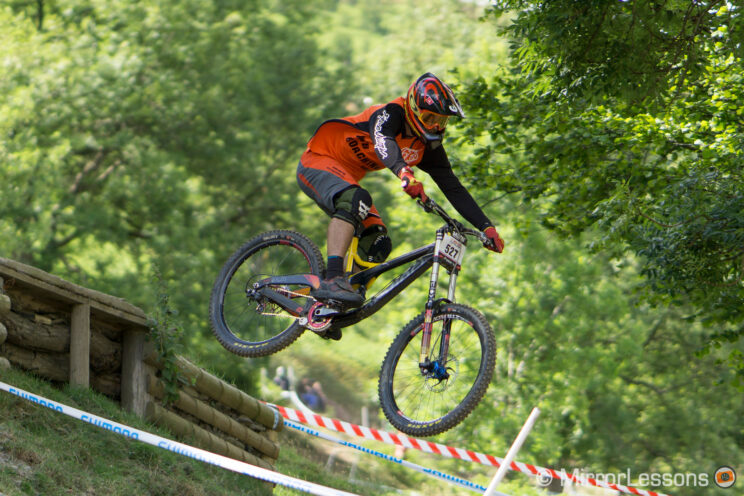 mountain bike rider in action in the forest