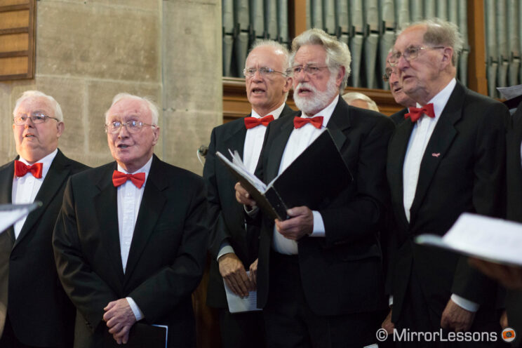 male choir singing in a church