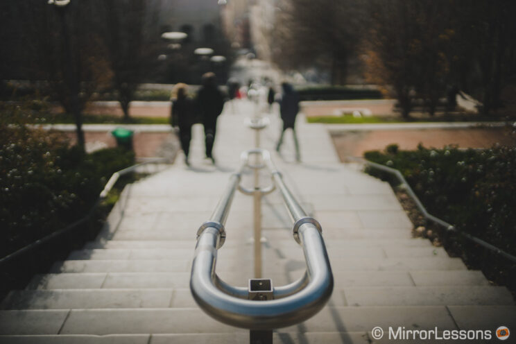 stairs of a park shot from above in Lyon, France, with the foreground in focus and the background out of focus