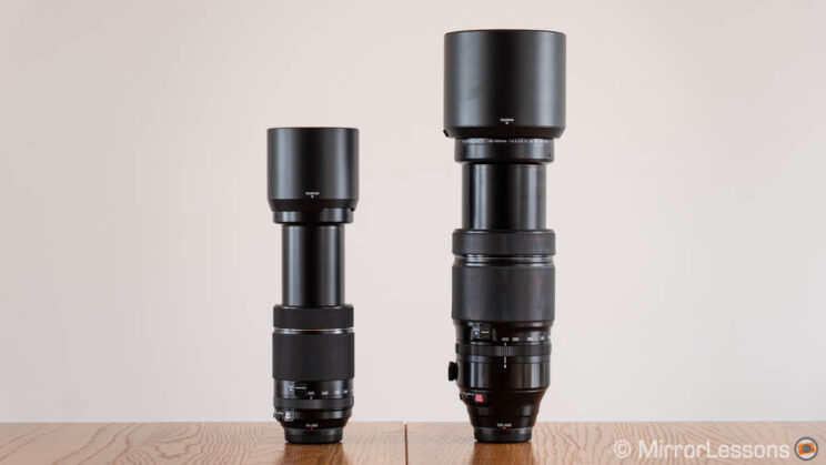 Fujifilm 70-300mm and 100-400mm side by side, extended with hoods