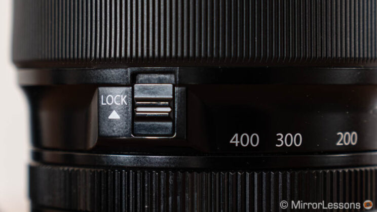 Fujifilm 100-400mm lock switch