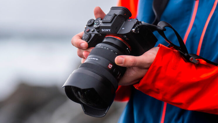 Male hands holding the A7R V