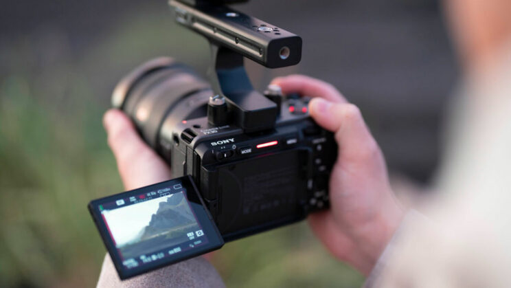 Hands holding the FX30 while recording