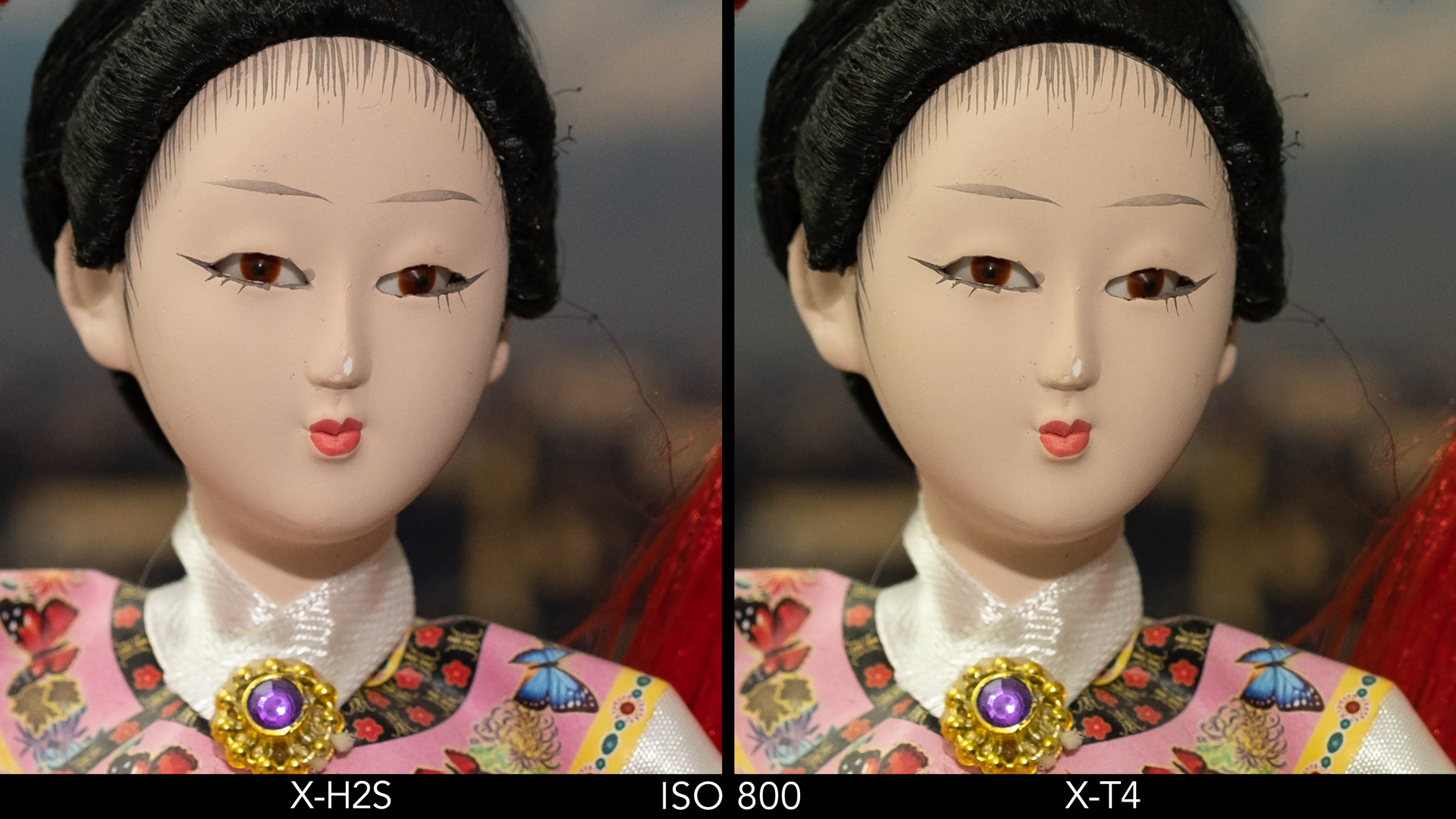 Side by side crop of the Japanese doll, showing the quality at ISO 800 for the X-H2S and X-T4