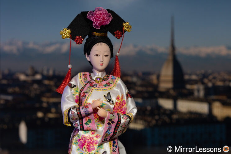 Japanese doll with city background