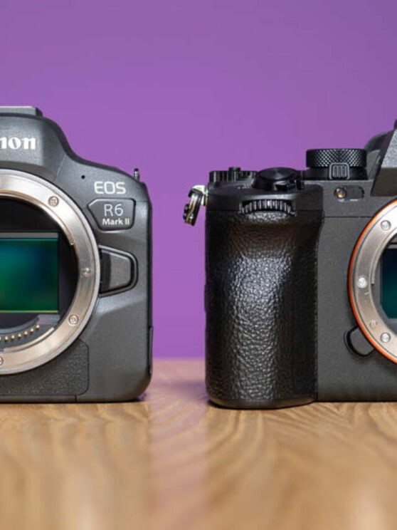 Canon R6 I and Sony A7 IV side by side, with sensor caps off