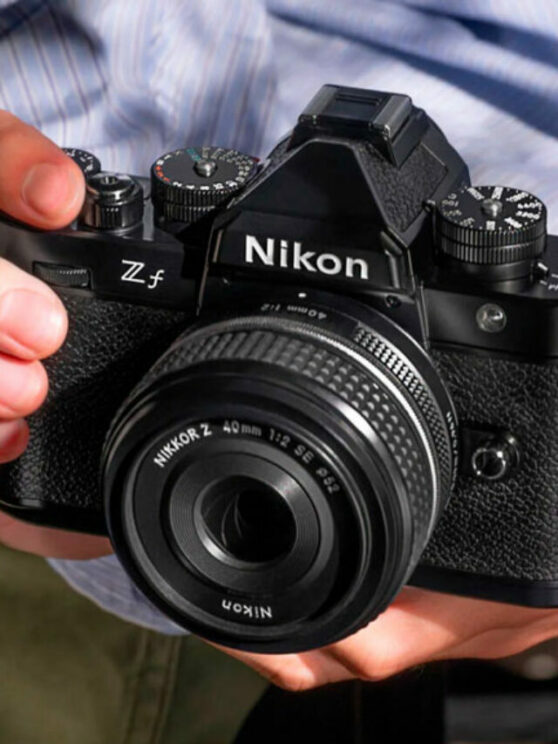 Male hands holding the Nikon Zf