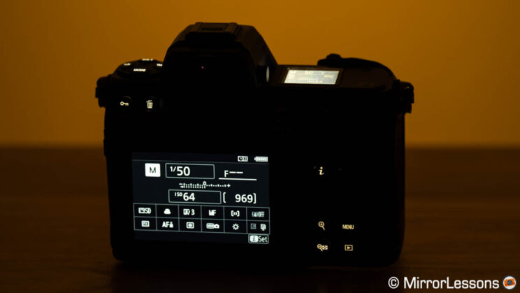Nikon Z8 in the dark with back-illuminated buttons lit.