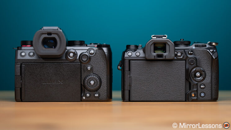 G9 II and OM-1 side by side, rear view