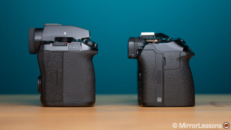 G9 II and OM-1 side by side, grips
